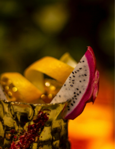 Fancy cocktail drink with exotic fruit